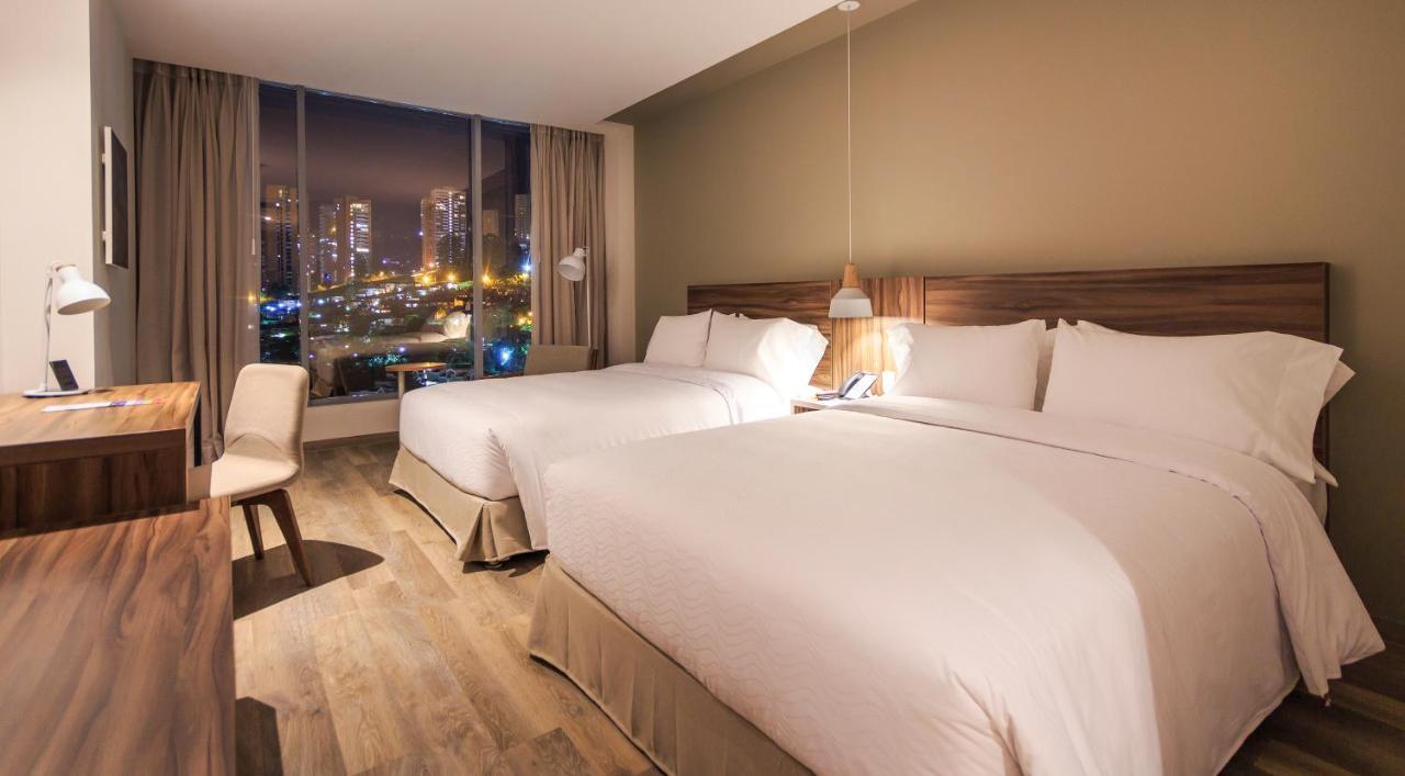 Novotel Medellin El Tesoro Eksteriør bilde A room at the hotel