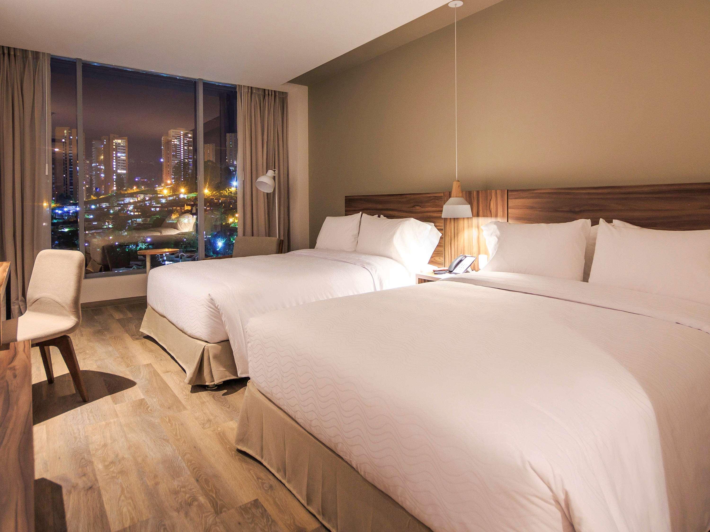 Novotel Medellin El Tesoro Eksteriør bilde A room at the hotel